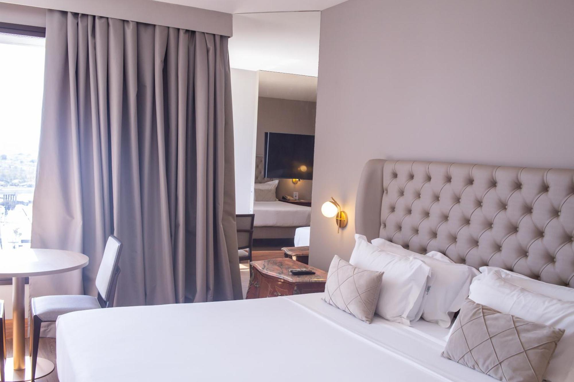 Ouro Minas Hotel Belo Horizonte, Dolce By Wyndham Dış mekan fotoğraf A bedroom at the hotel
